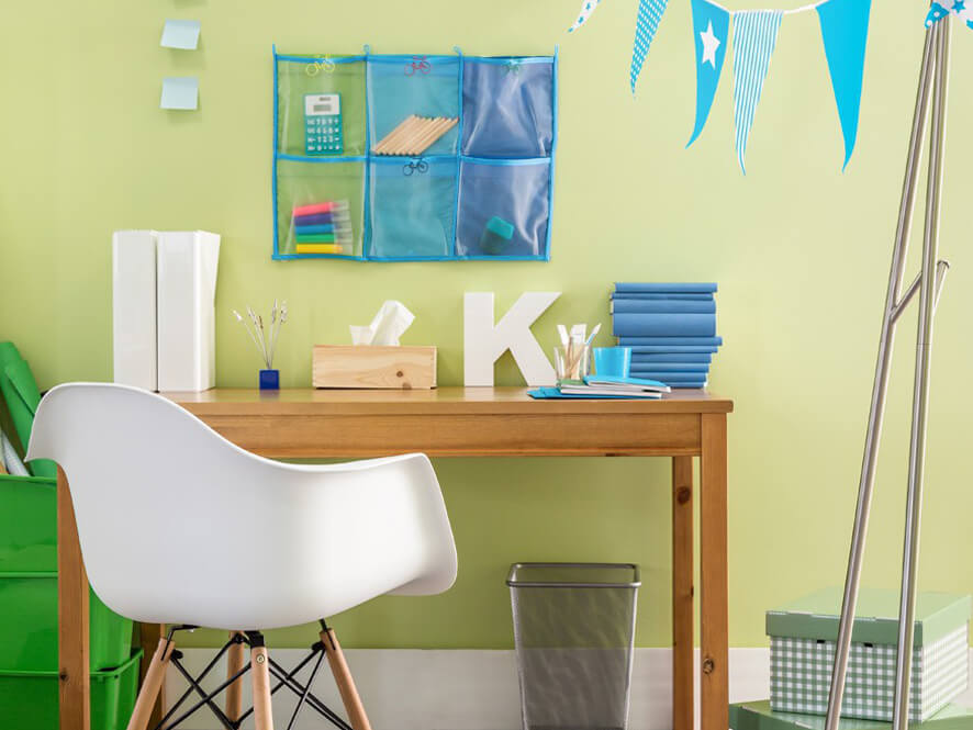Green_tween_study_space_timber_desk_white_chair_blue_cooks_green_containers_boxes_metal_bin